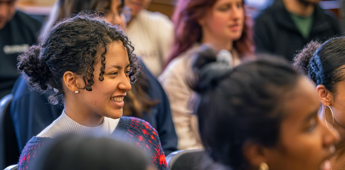 A student enjoying Gospel Chorus rehearsal