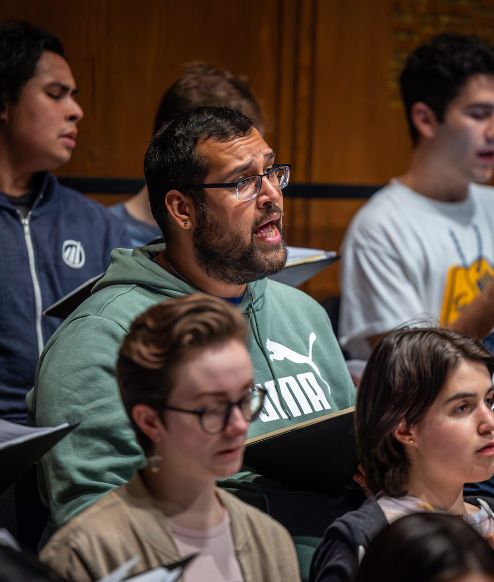 Grad student Rodney Padovani rehearses with the University Chorus