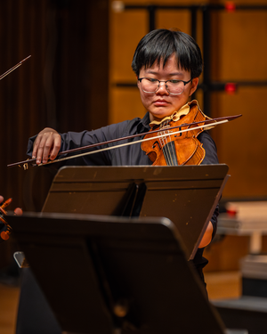 A member of the Early Music Ensemble performs in Hertz Concert Hall