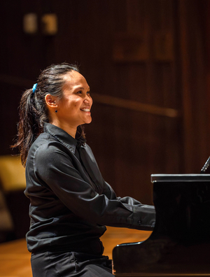 A student playing piano