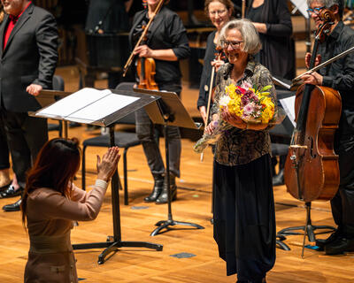 Cindy Cox is Recognized at a recent Eco Ensemble performance