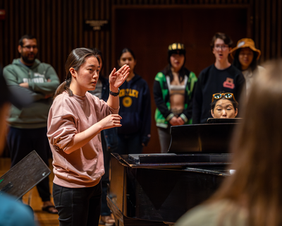 Jen instructs the Chamber Chorus